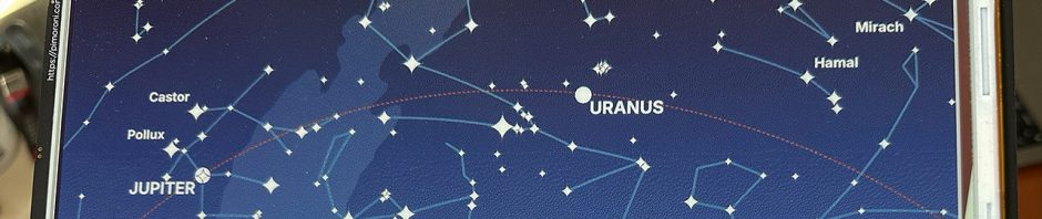 Detail of the Inky Impression e-ink display with a star map depicting on it.